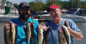 Bill & Danny Nelson bonding during a casting trip in June, in which they boxed a limit early. Danny comes back to Ohio from Alaska every year to visit with his family and fish Lake Erie walleye.